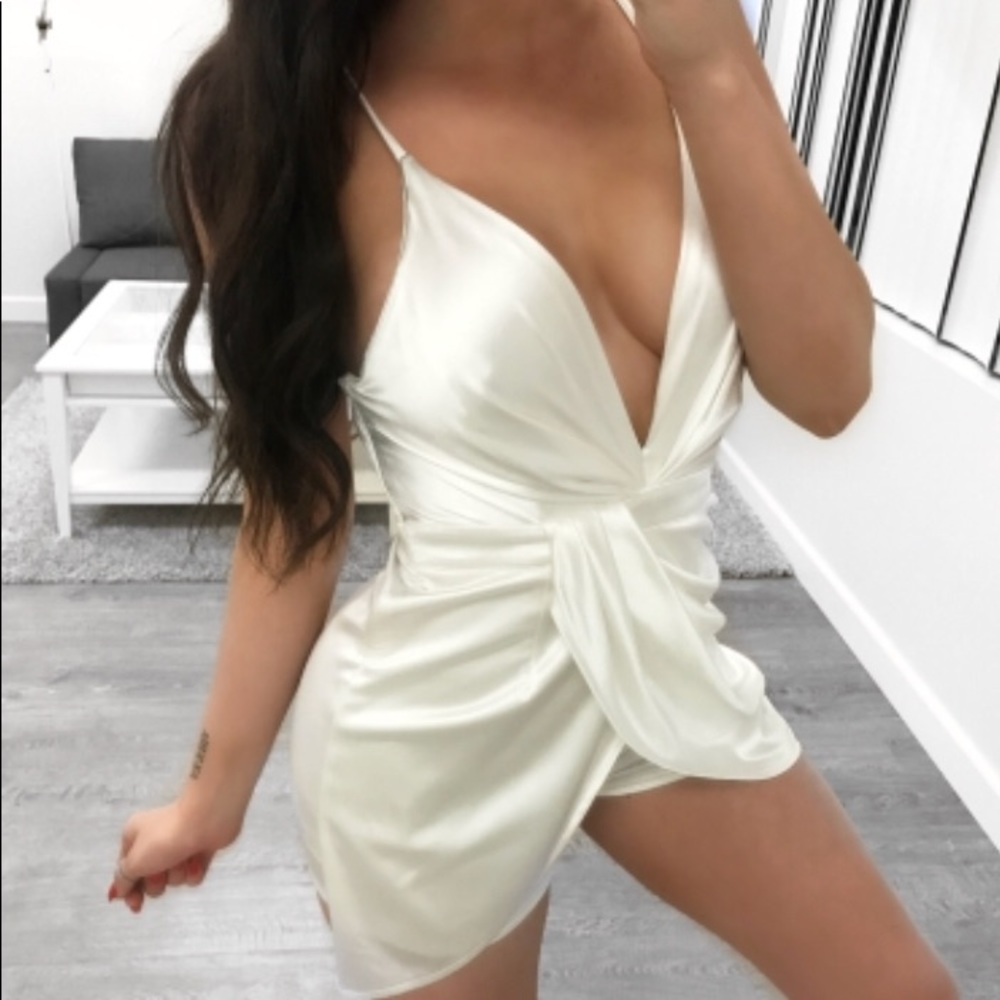 Romper ( never been worn ) silk white